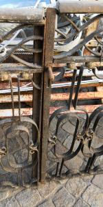 Small iron gate with spikes